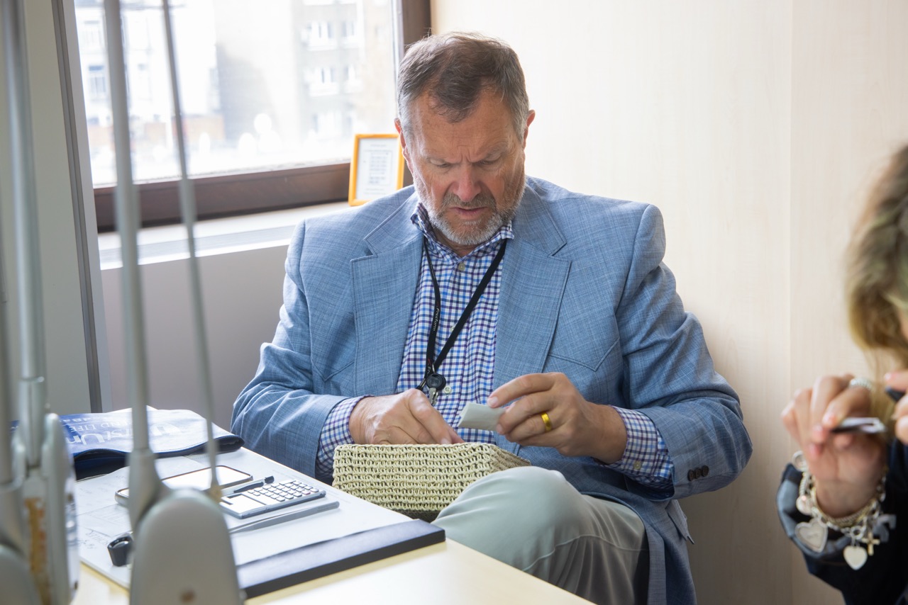 Newt Mitchell examining diamonds in Antwerp Belgium